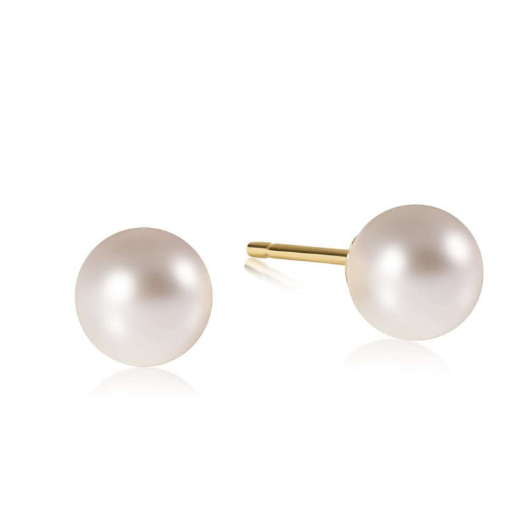 Classic pearl ball stud earring with a smooth spherical top.