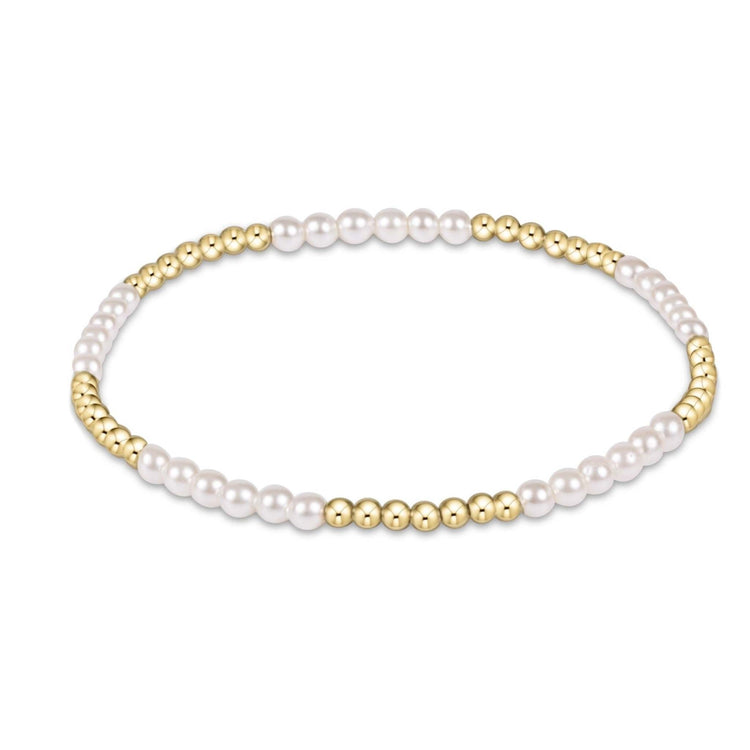 Classic Blissful Pattern bracelet featuring 2.5mm gold-filled beads alternating with 3mm pearls on elastic cord.