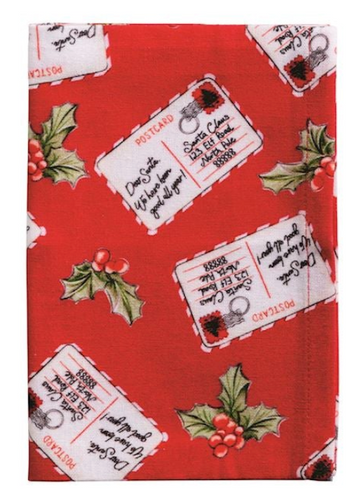 Hand-painted tin bucket holding a red cotton Christmas hand towel with white trim.