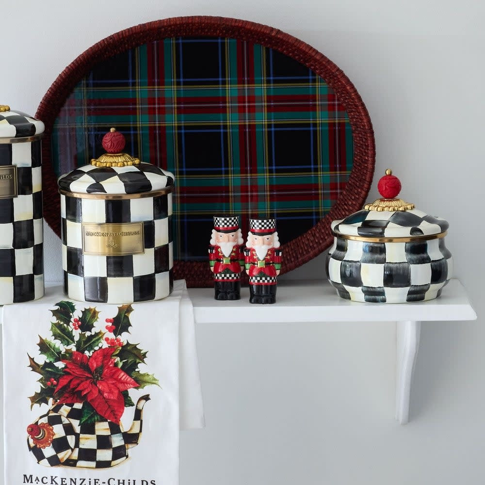 Hand-painted ceramic salt and pepper shakers in red, green checks with gold lustre trim.