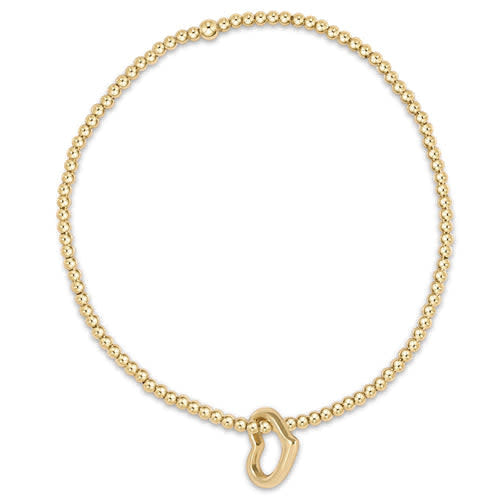 Gold-filled beaded bracelet with a love charm pendant