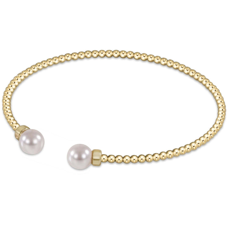 Classic gold-filled cuff bracelet featuring flexible 2mm beads.