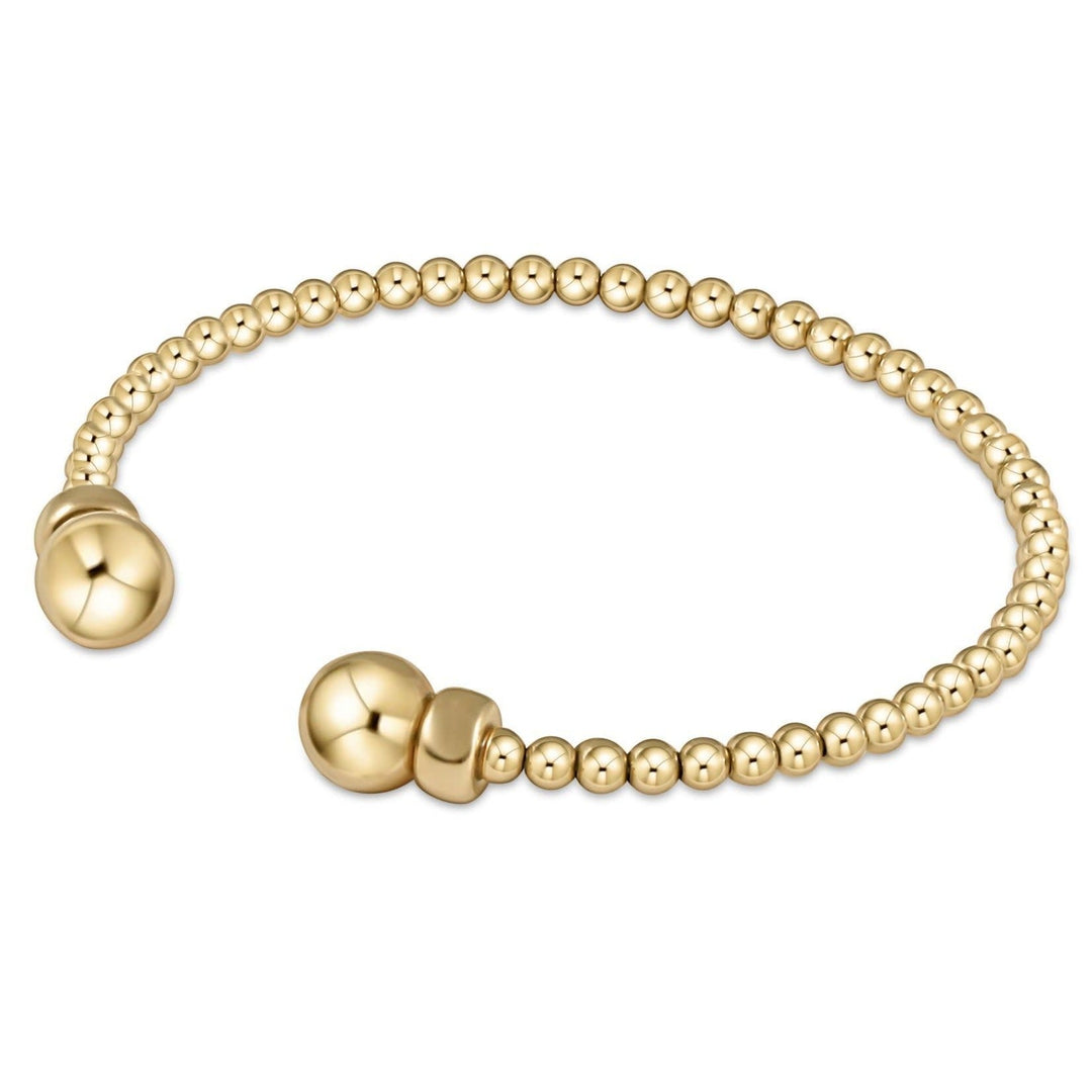 Classic gold-filled cuff bracelet featuring flexible 3mm beads in a solid circular silhouette.