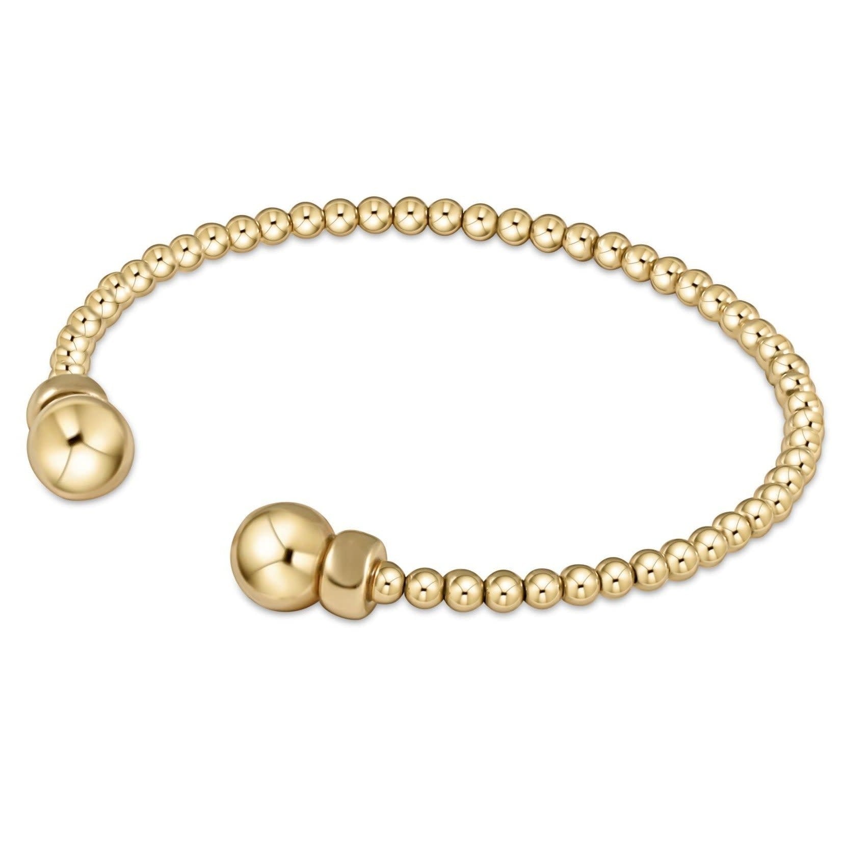 Classic gold-filled cuff bracelet featuring flexible 3mm beads in a solid circular silhouette.