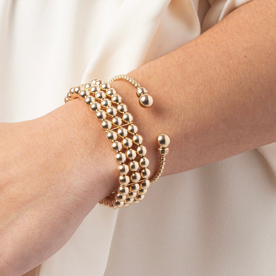 Classic gold-filled cuff bracelet featuring flexible 3mm beads that stack well with other jewelry.