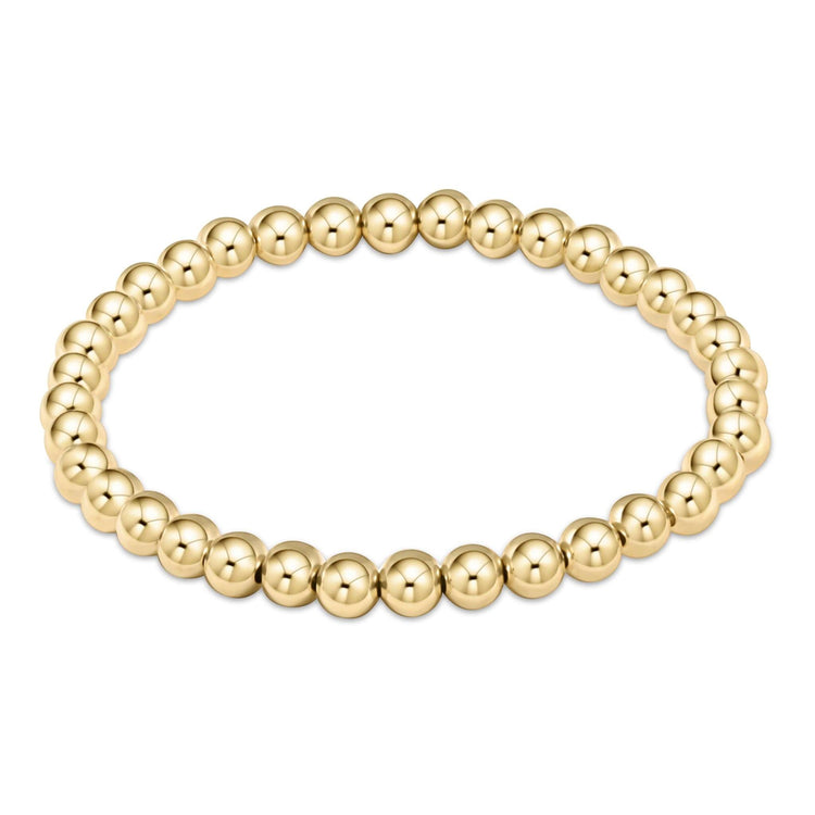 Classic gold-filled bracelet featuring five-millimeter beads on high-performance elastic cord.