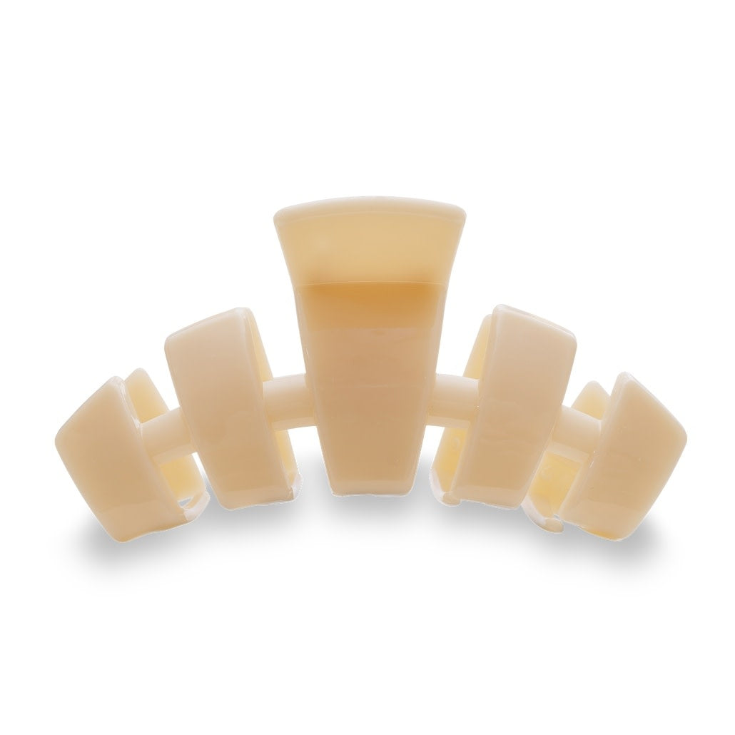 Almond beige classic hair clip with bendable teeth designed for thick hair.