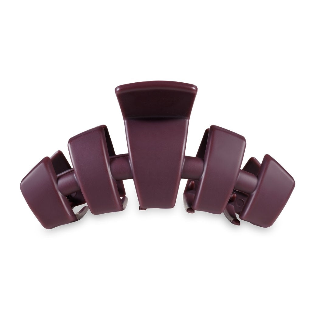 Large burgundy hair clip with bendable teeth designed for thick hair.