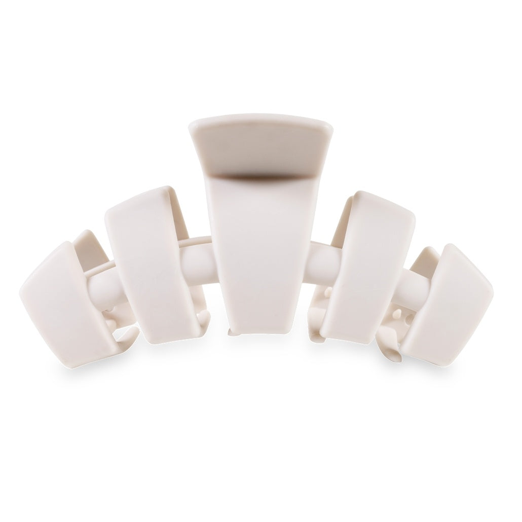 Large toasted brown hair clip with bendable teeth designed for thick hair.