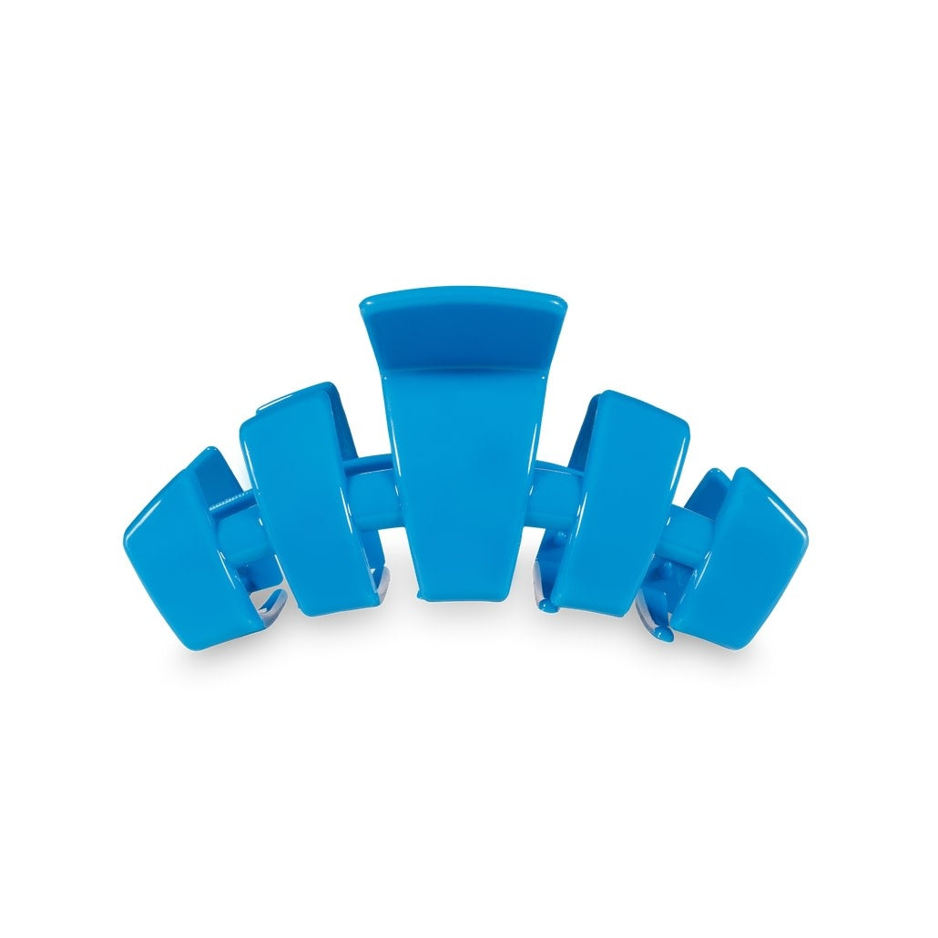 Medium-sized classic hair clip in Bora Bora color with a natural shell texture and curved silhouette.