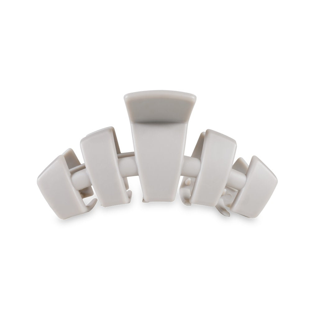 Silver classic hair clip with flame-patterned metal accents.