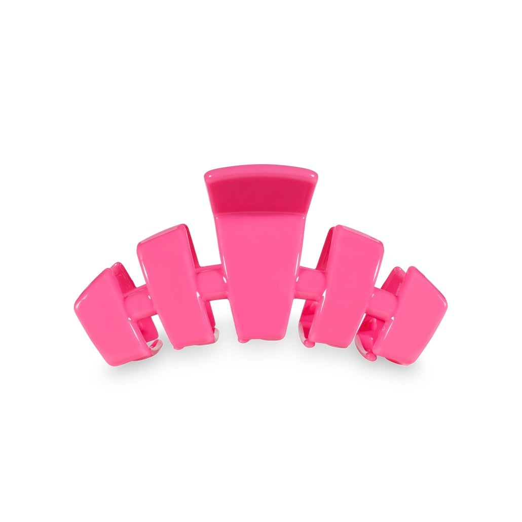 Small classic hair clip in paradise pink with bendable teeth.