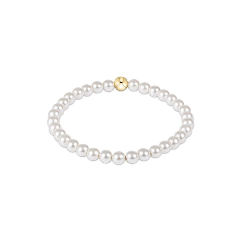 Classic pearl bracelet featuring five-millimeter round beads on a silver chain.