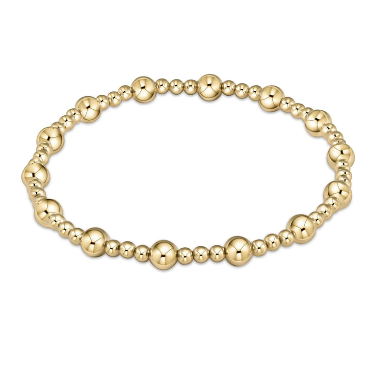 Gold-filled classic sincerity bracelet with alternating 3mm and 5mm beads on elastic
