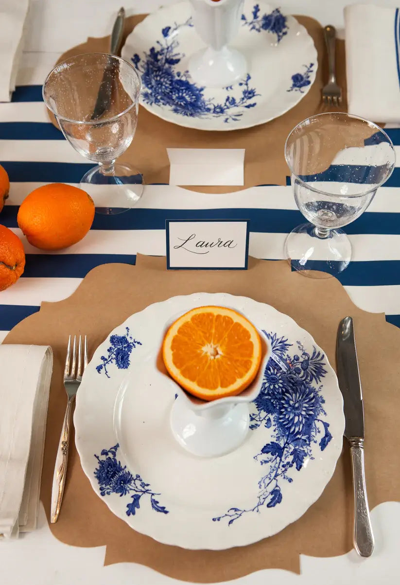 Classic Stripe Runner table runner with a white background featuring red and blue diagonal stripes.