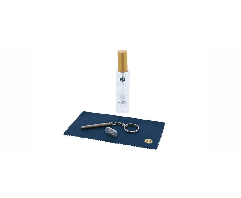 Cleaning kit with lens cleaner bottle, microfiber cloth, spare screws, and mini-screwdriver.