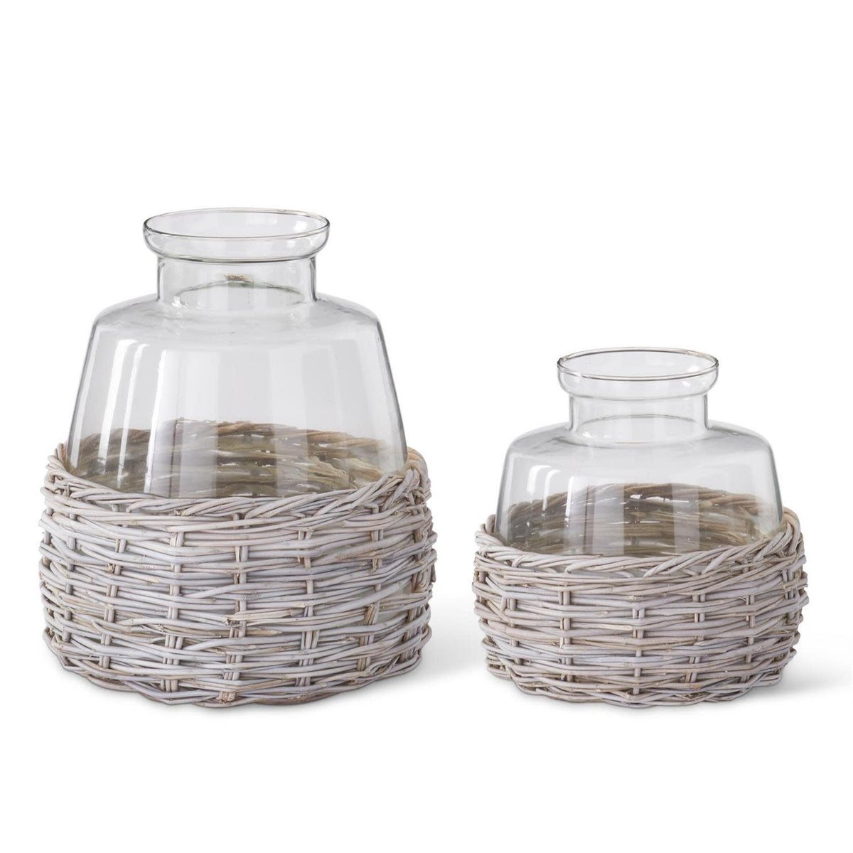 Clear glass vase with a whitewashed woven rattan basket base
