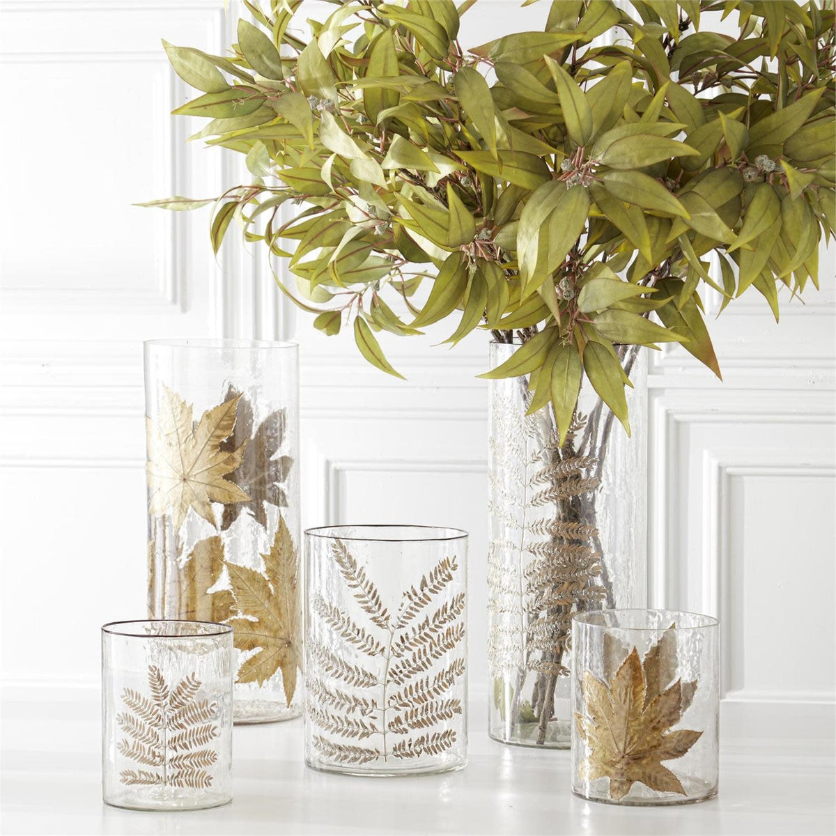 Clear textured glass cylinder vase with dried leaf applique accent