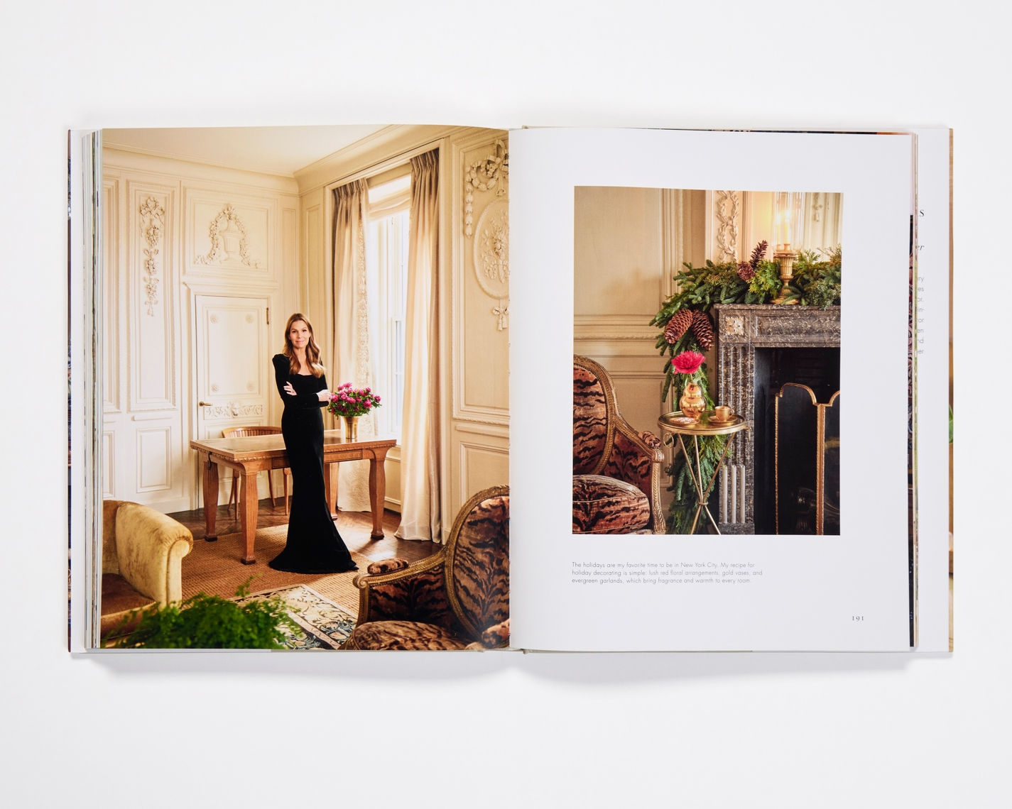 Open pages of Aerin Lauder: Living with Flowers book featuring interior holiday decor and portraits.