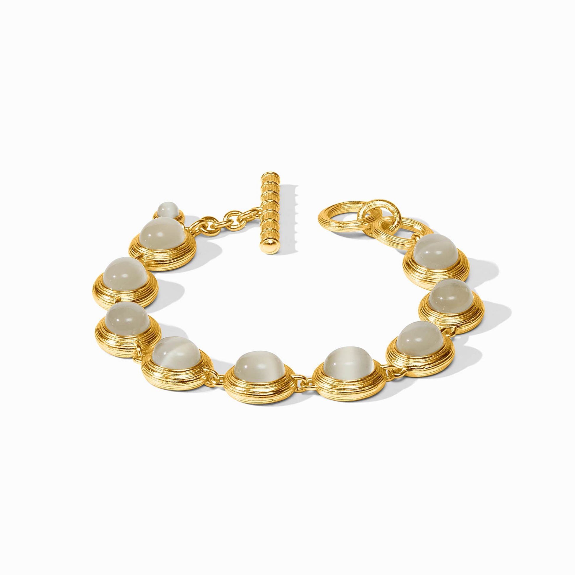 Cobblestone Tennis Bracelet in 24K gold plate with grey glass stones and a toggle closure.
