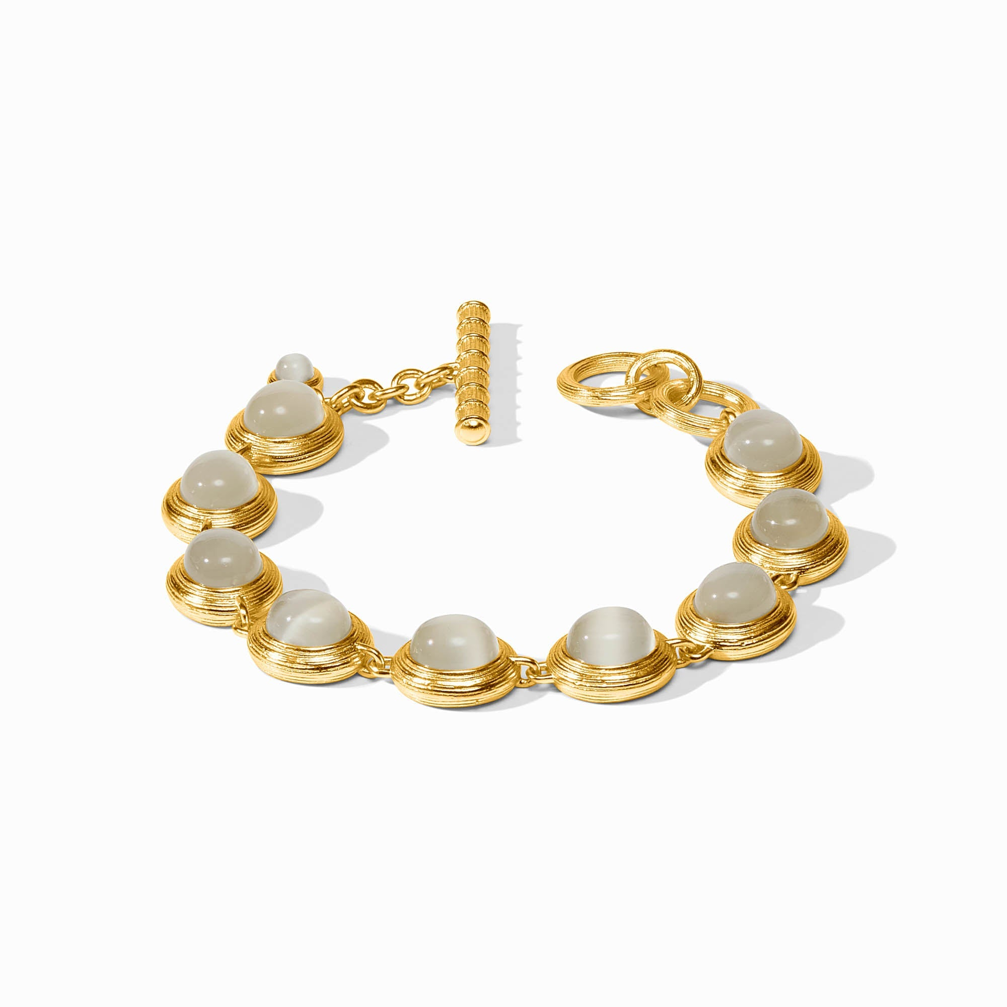 Cobblestone Tennis Bracelet in 24K gold plate with grey glass stones and a toggle closure.