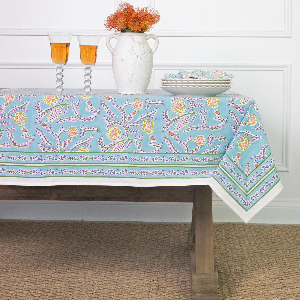 Sky blue cotton tablecloth with climbing dahlia floral pattern