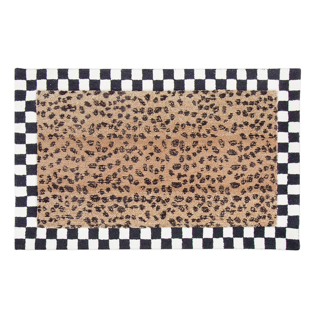 Handmade Cheetah rug with cheetah print pattern in wool and rayon blend.