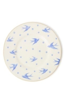 Handmade stoneware salad plate with a cloud-watching pattern in soft blue and white tones.