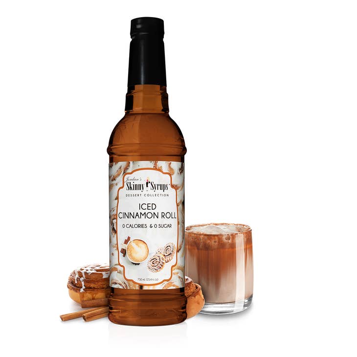 Bottle of sugar-free vanilla almond syrup with a white label.