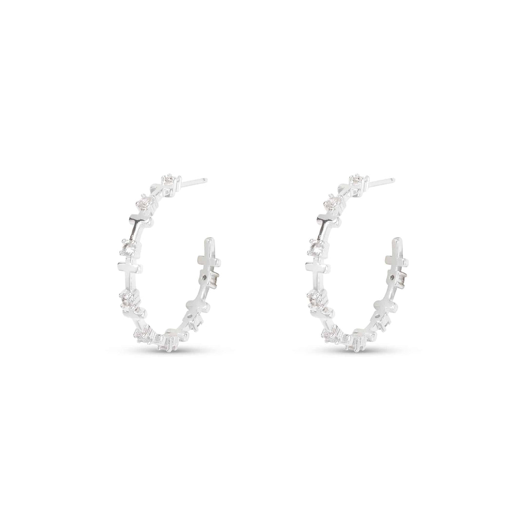 Silver CZ Infinity Cross Hoop Earrings featuring alternating cross and crystal-encrusted symbols.
