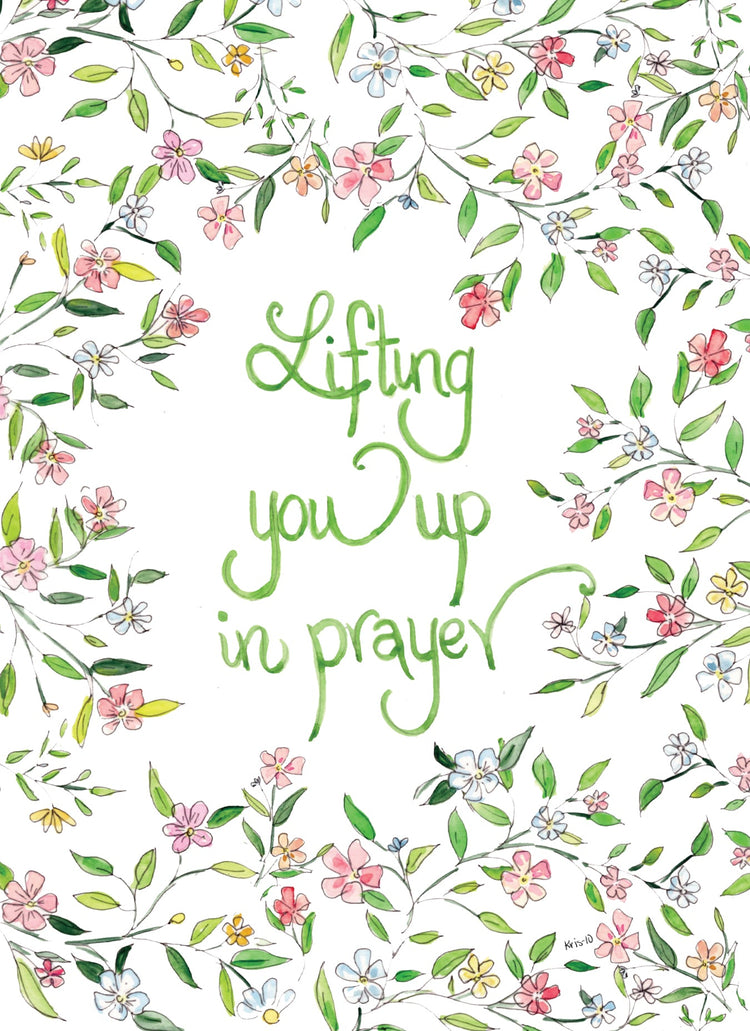 Greeting card with green script reading 'Lifting you up in prayer' framed by watercolor flowers.