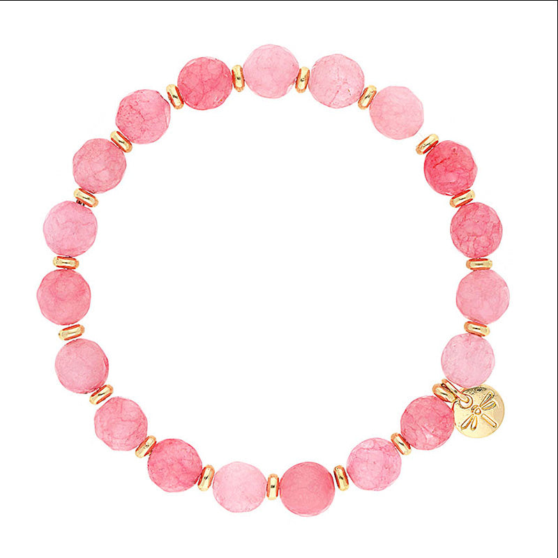 Lizas Beaumont Natural Bracelet featuring pink textured beads and gold-toned spacers and charm.