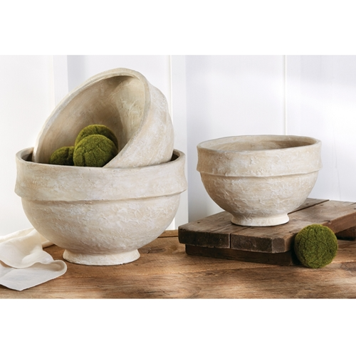Two textured paper mache bowls, one nested inside the other, with moss balls.