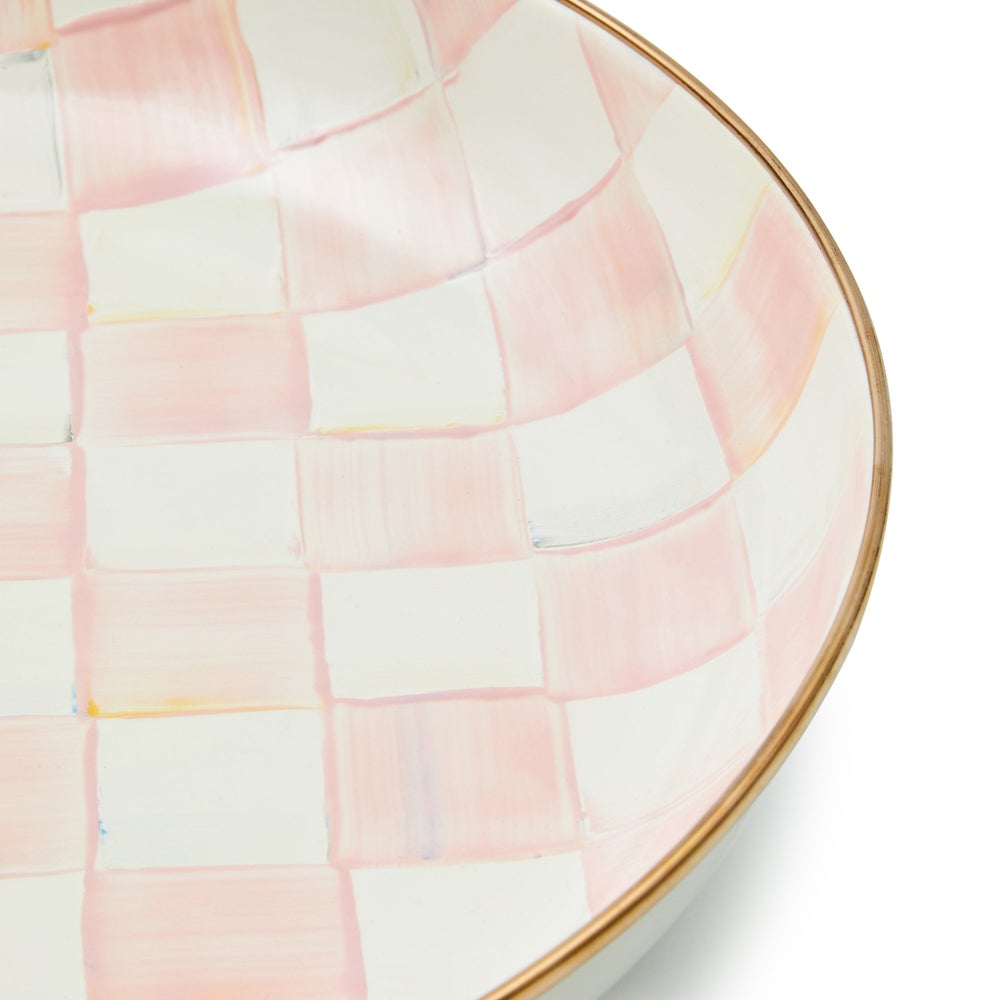 Hand-glazed steel bowl with hand-painted rosy check pattern on a bronzed stainless rim.
