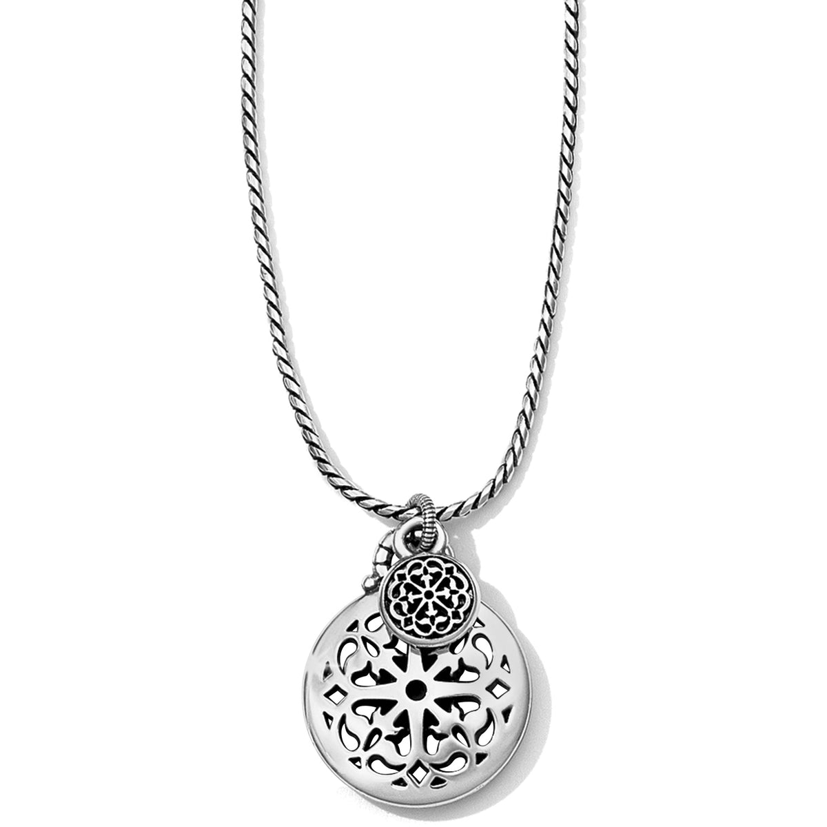 Ferrara Petite Necklace featuring a silver-plated chain with two circular filigree pendants.
