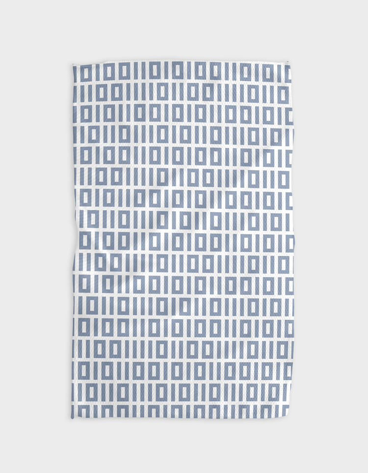 Recycled polyester waffle weave kitchen tea towel with single-sided geometric print in neutral tones.