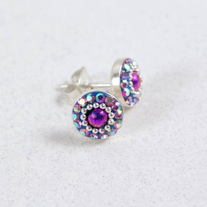 Sterling silver stud earrings featuring a colorful dot crystal center with a sparkling Austrian crystal pattern.