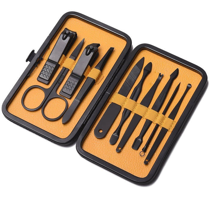 Orange grooming kit with hair tools, nail clippers, and face razor in a compact travel case.
