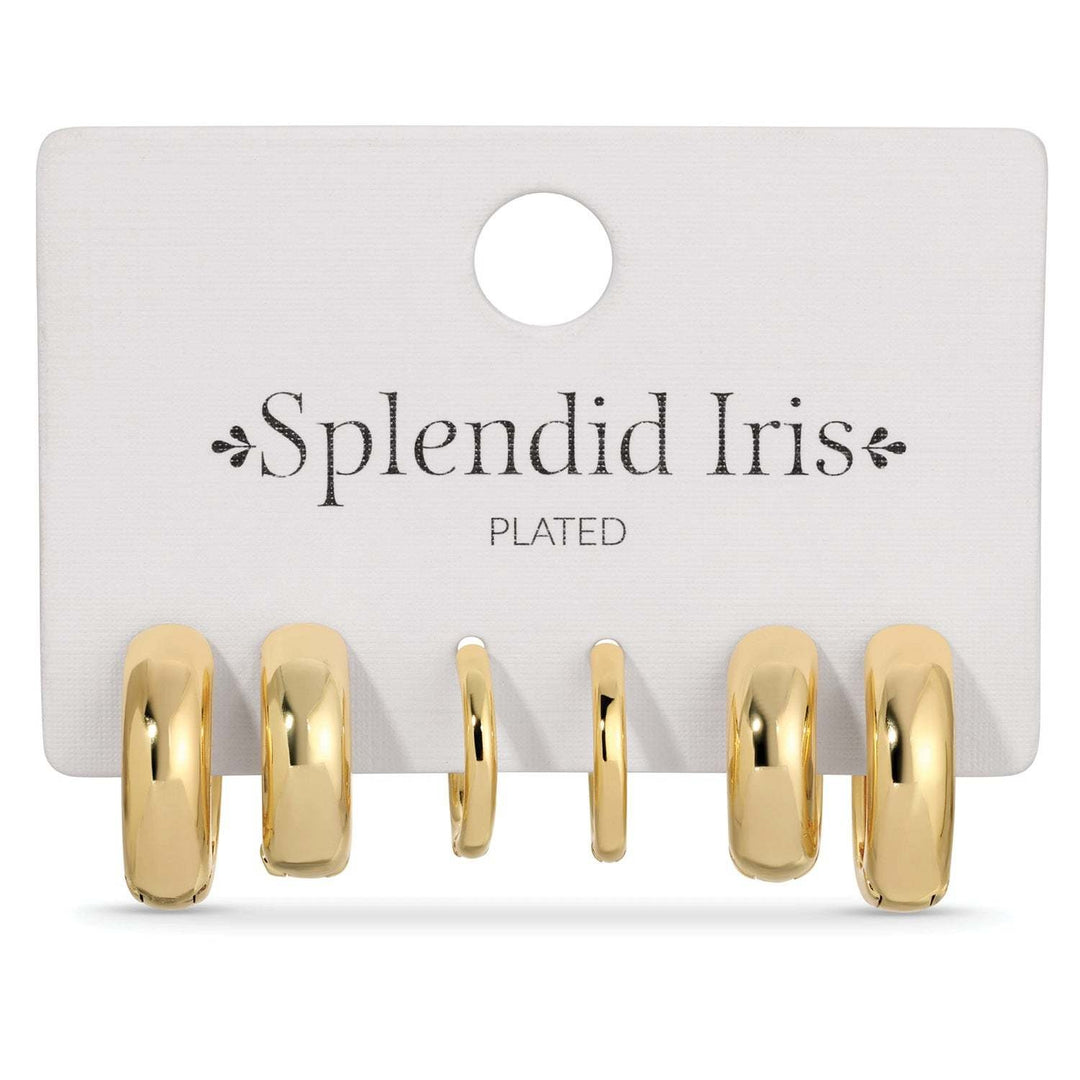 Set of three simple huggie earrings in assorted gold tones with rhodium plating.