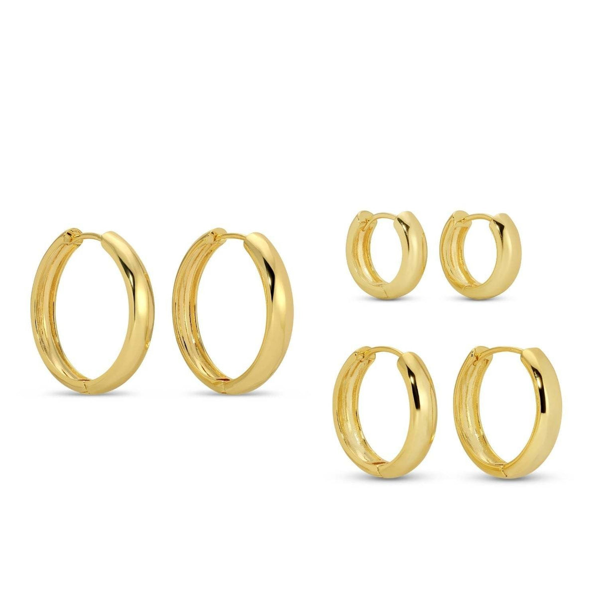 Set of three graduated huggie earrings in gold-tone metal with rhodium plating options.