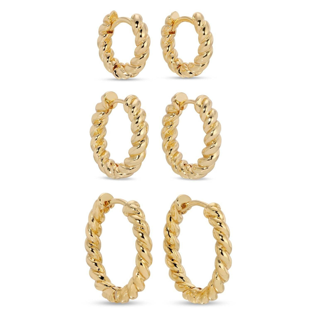 Set of three twisted huggie hoop earrings in gold-plated brass.