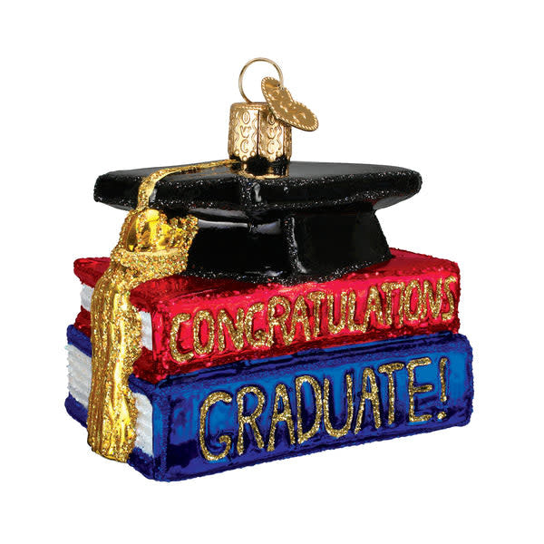 Handcrafted glass ornament shaped like a graduation cap with 'Congrats Graduate' text.