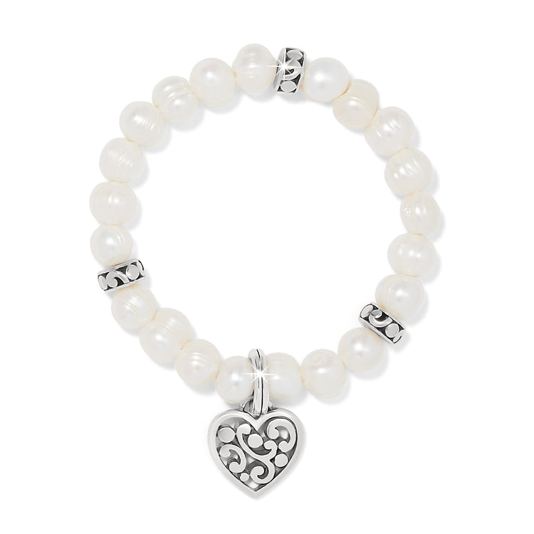 Silver-plated stretch bracelet featuring freshwater pearls and a heart-shaped charm.