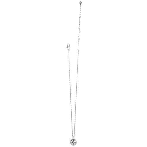 Silver plated circular pendant necklace with swirl scroll patterns on a silver chain.