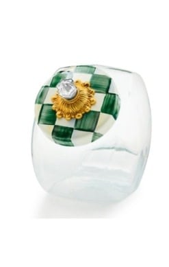 Glass cookie jar with emerald checkered lid featuring brass knob