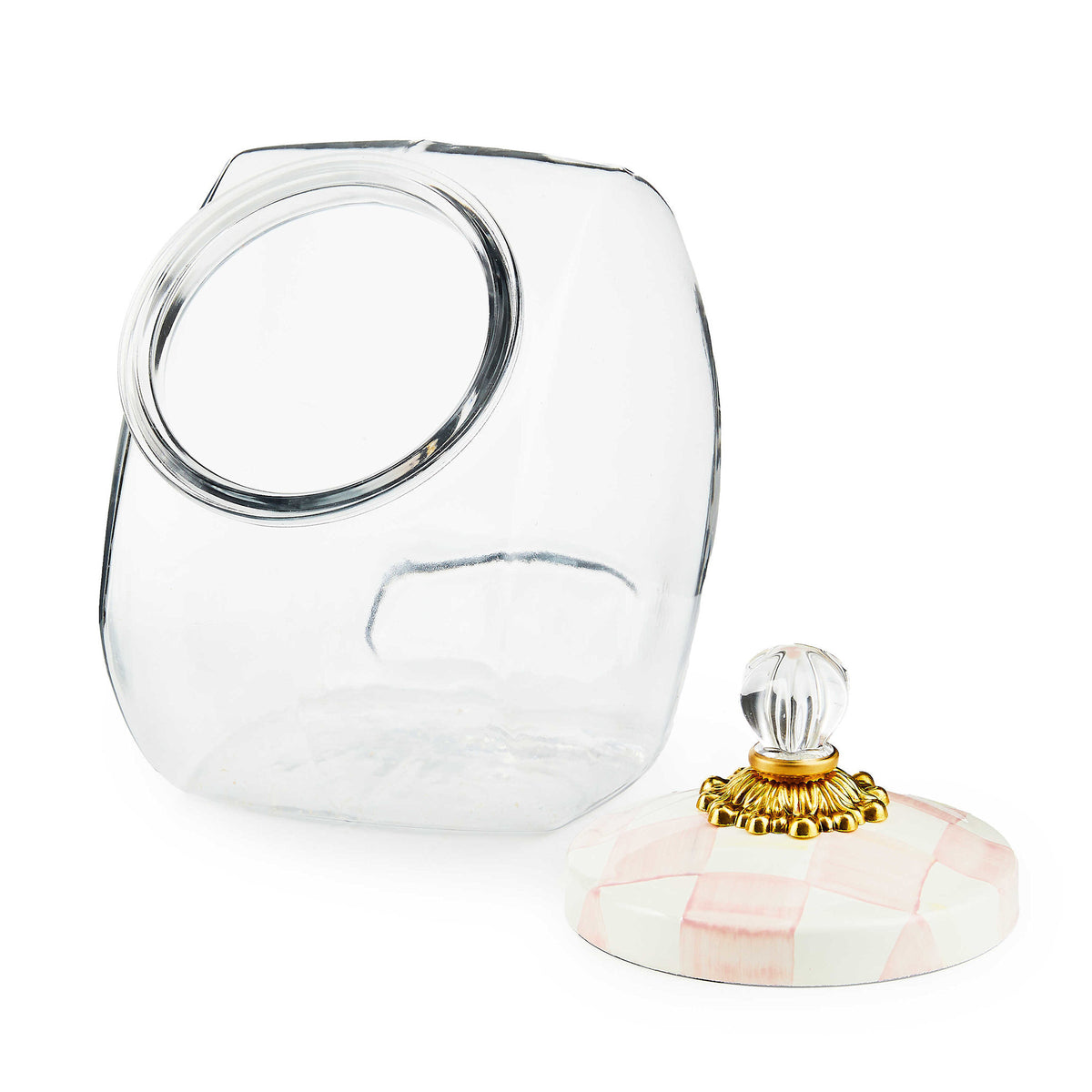 Glass cookie jar with rosy checkered lid featuring hand-glazed steel body, brass hardware, and glass knob.
