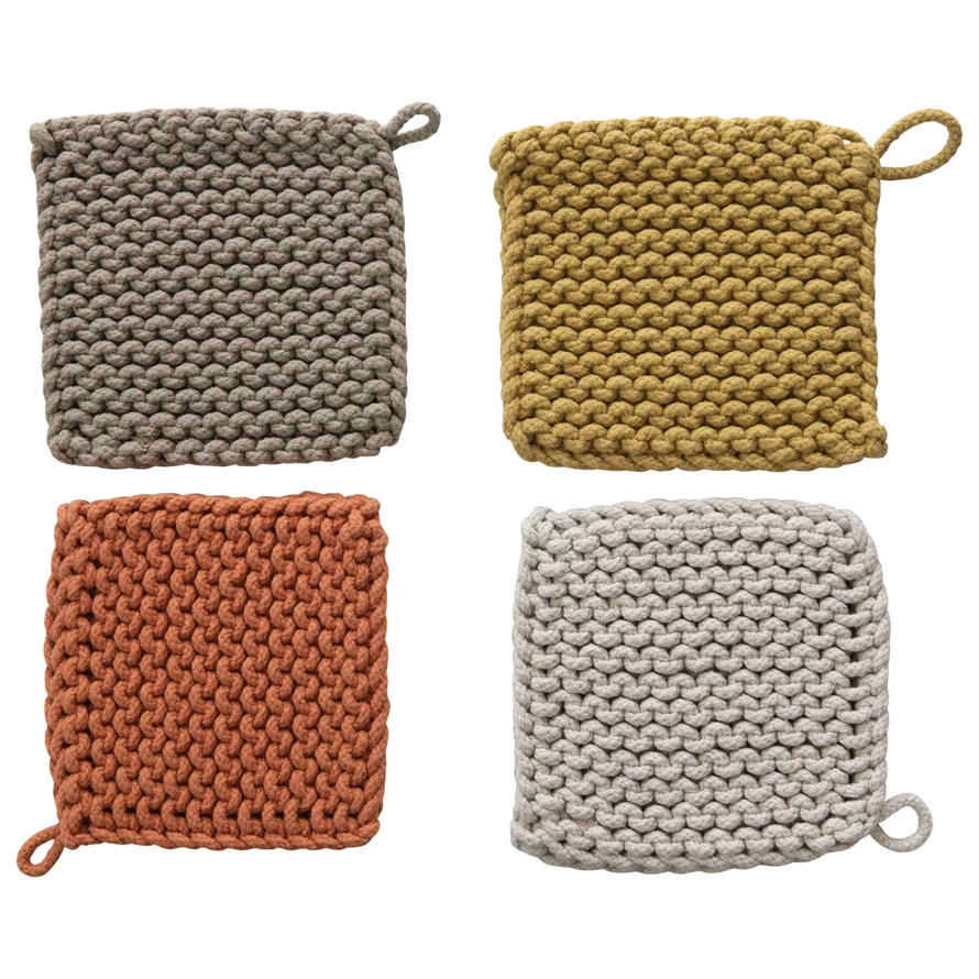Square hand-woven cotton crocheted pot holder with a hanging loop in natural beige.