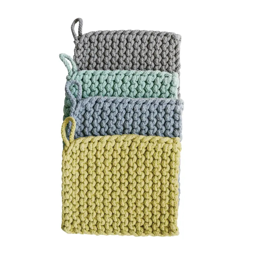8-inch square cotton crocheted pot holder in natural beige with openwork lace pattern.