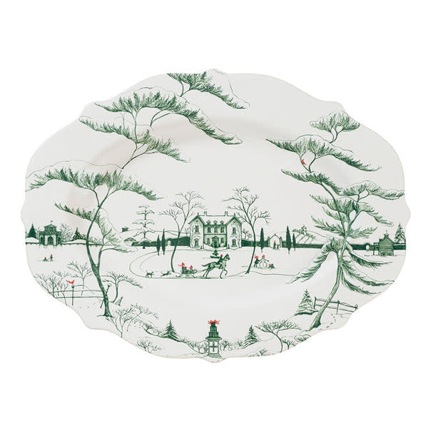 Evergreen Country Estate winter platter featuring snow-covered estate scene with sleigh rides and snowmen on stoneware