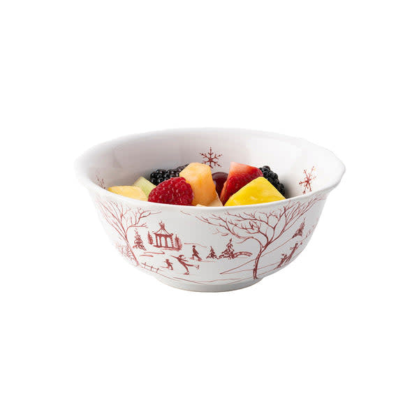 Ruby ceramic cereal bowl featuring playful woodland animal patterns in a winter landscape.